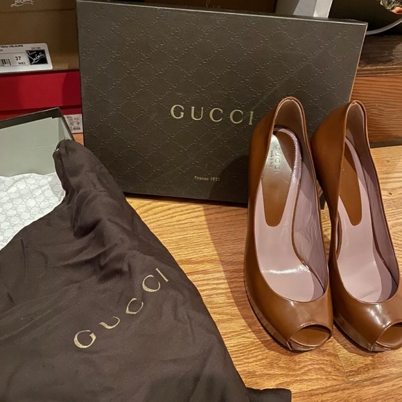 100% authentic - NIB never worn, open toe, tan stilettos